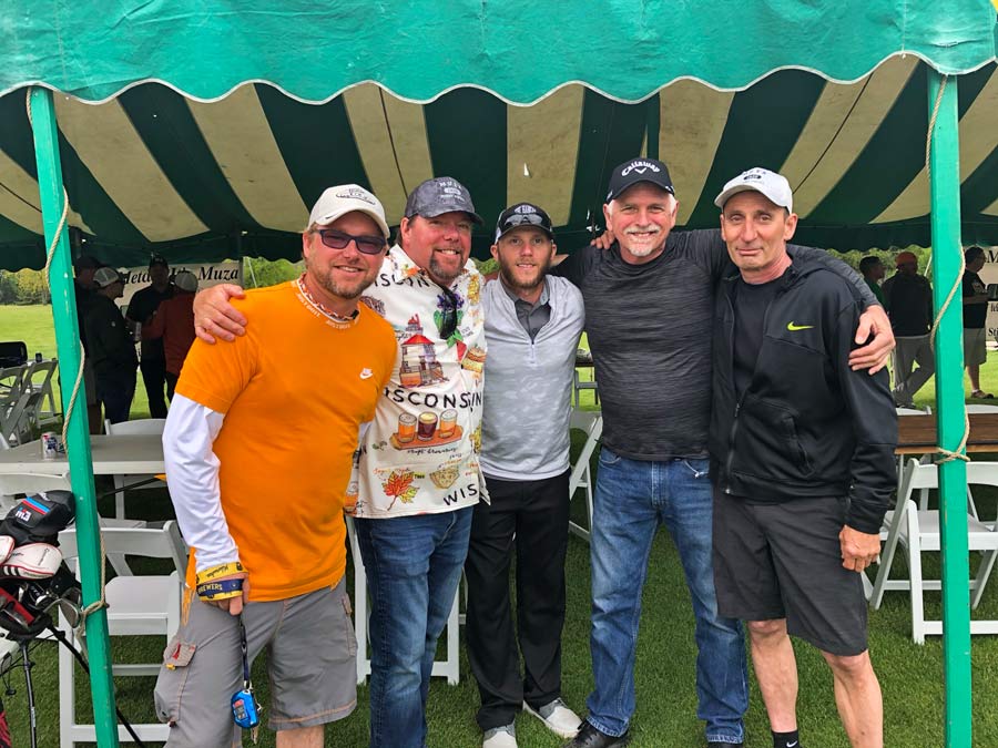 Muza employees at golf outing