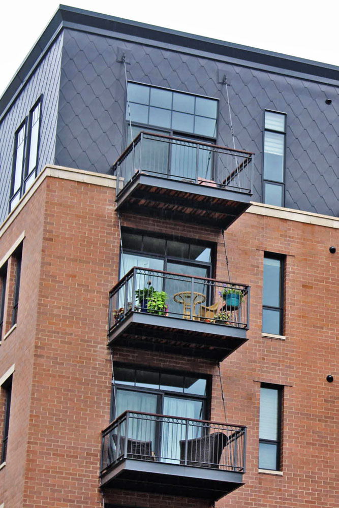 Apartment building with flat lock panels